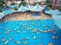 A large number of tourists are cooling off at a water park in Hangzhou, China, on July 21, 2024. (