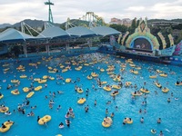 A large number of tourists are cooling off at a water park in Hangzhou, China, on July 21, 2024. (