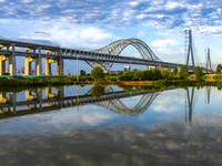 The steel deck pavement of the main channel bridge of the Changtai Yangtze River Bridge is under construction in Taixing, China, on July 21,...