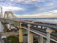 The steel deck pavement of the main channel bridge of the Changtai Yangtze River Bridge is under construction in Taixing, China, on July 21,...