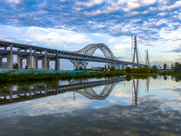 The steel deck pavement of the main channel bridge of the Changtai Yangtze River Bridge is under construction in Taixing, China, on July 21,...