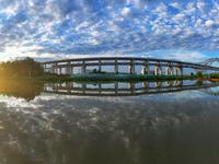 The steel deck pavement of the main channel bridge of the Changtai Yangtze River Bridge is under construction in Taixing, China, on July 21,...