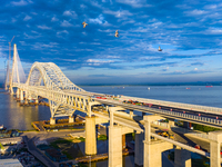 The steel deck pavement of the main channel bridge of the Changtai Yangtze River Bridge is under construction in Taixing, China, on July 21,...