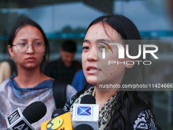 Mahima, a Nepali student who is returning from violence-hit Bangladesh, is speaking to the media upon arriving at Tribhuvan International Ai...