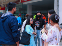 A Nepali student who is returning to Nepal from violence-hit Bangladesh is hugging her relative upon arrival at Tribhuvan International Airp...