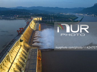 A spectacular view is showing the opening of the Three Gorges Dam to release floodwater in Yichang, Hubei province, China, on July 21, 2024....