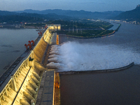 A spectacular view is showing the opening of the Three Gorges Dam to release floodwater in Yichang, Hubei province, China, on July 21, 2024....