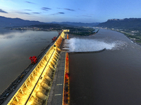 A spectacular view is showing the opening of the Three Gorges Dam to release floodwater in Yichang, Hubei province, China, on July 21, 2024....