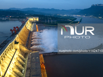 A spectacular view is showing the opening of the Three Gorges Dam to release floodwater in Yichang, Hubei province, China, on July 21, 2024....