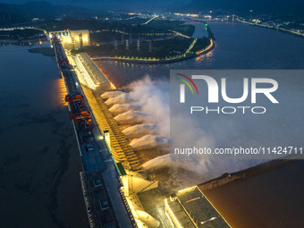 A spectacular view is showing the opening of the Three Gorges Dam to release floodwater in Yichang, Hubei province, China, on July 21, 2024....