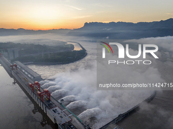 A spectacular view is showing the opening of the Three Gorges Dam to release floodwater in Yichang, Hubei province, China, on July 21, 2024....