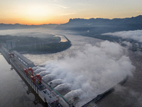 A spectacular view is showing the opening of the Three Gorges Dam to release floodwater in Yichang, Hubei province, China, on July 21, 2024....