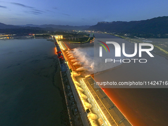 A spectacular view is showing the opening of the Three Gorges Dam to release floodwater in Yichang, Hubei province, China, on July 21, 2024....