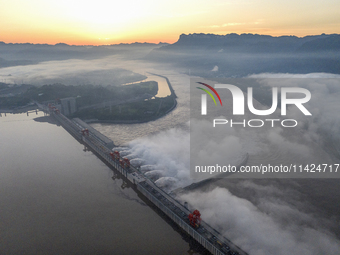 A spectacular view is showing the opening of the Three Gorges Dam to release floodwater in Yichang, Hubei province, China, on July 21, 2024....