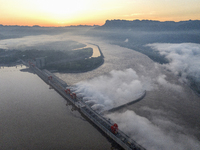 A spectacular view is showing the opening of the Three Gorges Dam to release floodwater in Yichang, Hubei province, China, on July 21, 2024....