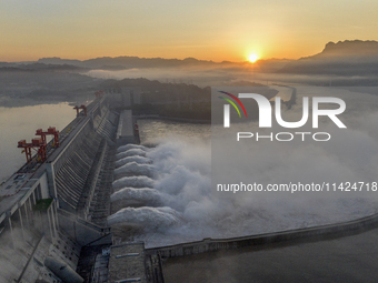 A spectacular view is showing the opening of the Three Gorges Dam to release floodwater in Yichang, Hubei province, China, on July 21, 2024....