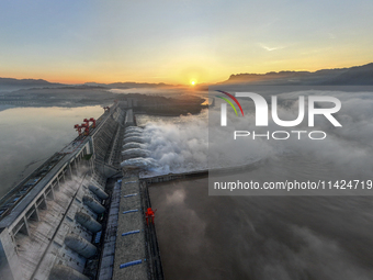 A spectacular view is showing the opening of the Three Gorges Dam to release floodwater in Yichang, Hubei province, China, on July 21, 2024....