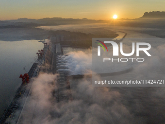 A spectacular view is showing the opening of the Three Gorges Dam to release floodwater in Yichang, Hubei province, China, on July 21, 2024....