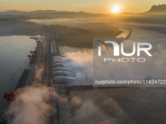 A spectacular view is showing the opening of the Three Gorges Dam to release floodwater in Yichang, Hubei province, China, on July 21, 2024....