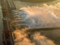 A spectacular view is showing the opening of the Three Gorges Dam to release floodwater in Yichang, Hubei province, China, on July 21, 2024....