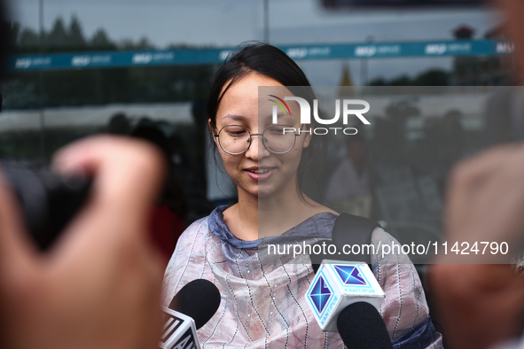 Sadikshya Basent, a Nepali student who is returning from violence-hit Bangladesh, is speaking to the media upon arriving at Tribhuvan Intern...