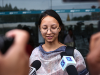 Sadikshya Basent, a Nepali student who is returning from violence-hit Bangladesh, is speaking to the media upon arriving at Tribhuvan Intern...