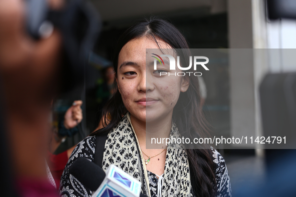 Mahima, a Nepali student who is returning from violence-hit Bangladesh, is speaking to the media upon arriving at Tribhuvan International Ai...