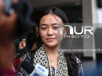 Mahima, a Nepali student who is returning from violence-hit Bangladesh, is speaking to the media upon arriving at Tribhuvan International Ai...