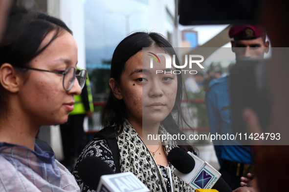 Mahima, a Nepali student who is returning from violence-hit Bangladesh, is speaking to the media upon arriving at Tribhuvan International Ai...