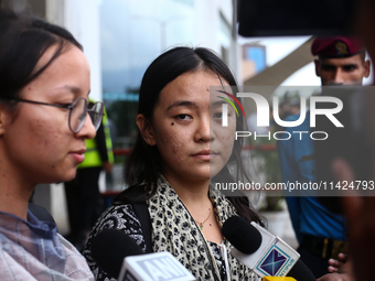 Mahima, a Nepali student who is returning from violence-hit Bangladesh, is speaking to the media upon arriving at Tribhuvan International Ai...