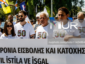 A group of Greek-Cypriots and Turkish-Cypriots is gathering at the Ledra Palace checkpoint to protest about the situation in Cyprus, demandi...