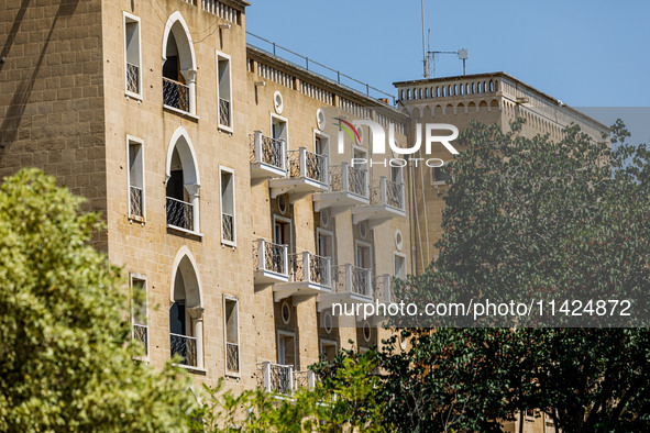 Bullet holes are still visible on the building of the former luxury Ledra Palace hotel inside the buffer zone, which is now being used by th...