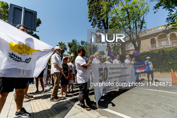 A group of Greek-Cypriots and Turkish-Cypriots is gathering at the Ledra Palace checkpoint to protest about the situation in Cyprus, demandi...