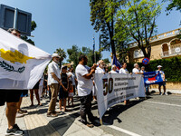 A group of Greek-Cypriots and Turkish-Cypriots is gathering at the Ledra Palace checkpoint to protest about the situation in Cyprus, demandi...