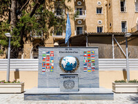 A monument for the 60 years of UNFICYP service in Cyprus is being seen in front of the Ledra Palace hotel in Nicosia, Cyprus, on July 20, 20...