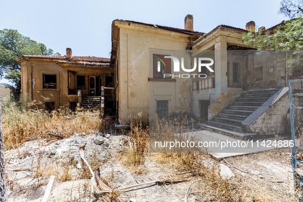 An abandoned house that is being used as a defensive point during the 1974 war is seen near Ledra Palace checkpoint in Nicosia, Cyprus, on J...