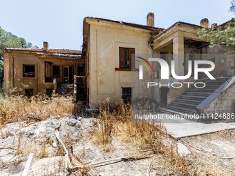 An abandoned house that is being used as a defensive point during the 1974 war is seen near Ledra Palace checkpoint in Nicosia, Cyprus, on J...