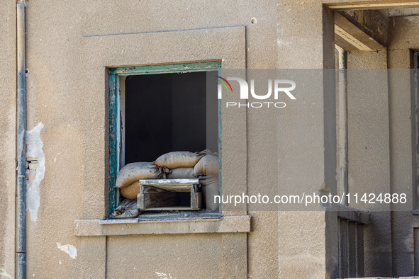 An abandoned house that is being used as a defensive point during the 1974 war is seen near Ledra Palace checkpoint in Nicosia, Cyprus, on J...