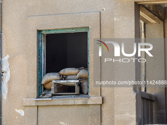 An abandoned house that is being used as a defensive point during the 1974 war is seen near Ledra Palace checkpoint in Nicosia, Cyprus, on J...