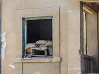 An abandoned house that is being used as a defensive point during the 1974 war is seen near Ledra Palace checkpoint in Nicosia, Cyprus, on J...