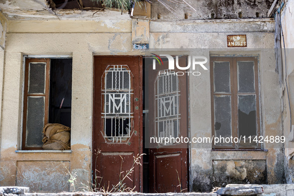 An abandoned house that is being used as a defensive point during the 1974 war is seen near Ledra Palace checkpoint in Nicosia, Cyprus, on J...