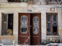 An abandoned house that is being used as a defensive point during the 1974 war is seen near Ledra Palace checkpoint in Nicosia, Cyprus, on J...