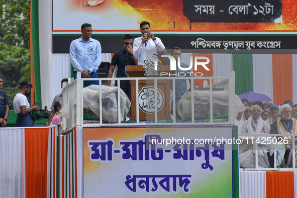 Trinamool Congress (TMC) leader Avhishek Banerjee is addressing the crowd during the annual martyrs' day rally held by the TMC party in Kolk...