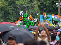 A large cutout of the TMC emblem is being seen during the annual martyrs' day rally held by the TMC party in Kolkata, India, on July 21, 202...