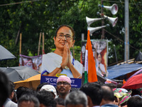 A large cutout of TMC supremo CM Mamata Banerjee is being seen at the annual martyrs' day rally held by the TMC party in Kolkata, India, on...