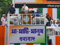 The Chief Minister of West Bengal and TMC supremo, Sri Mamata Banerjee, is addressing the crowd during the annual Martyrs' Day rally held by...