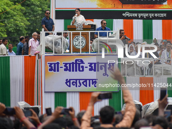 The Chief Minister of West Bengal and TMC supremo, Sri Mamata Banerjee, is addressing the crowd during the annual Martyrs' Day rally held by...