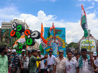 People are attending the annual Martyrs' Day rally held by the TMC party in Kolkata, India, on July 21, 2024. (