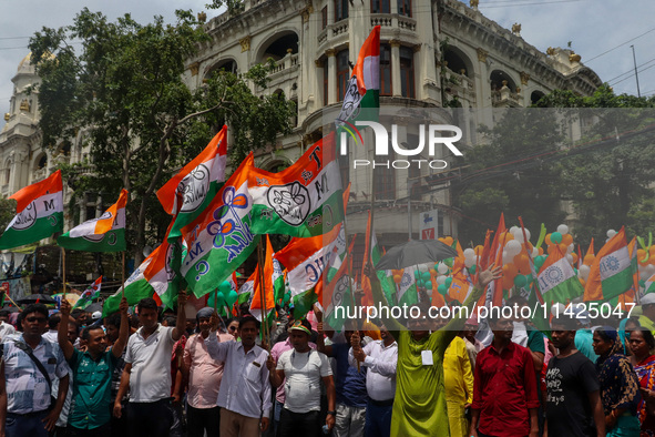 People are attending the annual Martyrs' Day rally held by the TMC party in Kolkata, India, on July 21, 2024. 