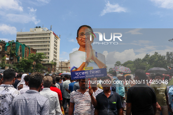 A large cutout of TMC supremo CM Mamata Banerjee is being seen at the annual martyrs' day rally held by the TMC party in Kolkata, India, on...